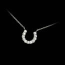A 18kt white gold horse shoe diamond necklace set with 11 diamonds weighing .36ct.  VS G-H diamonds.