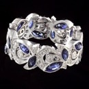 A beautiful and unique 18k white gold Beverley K eternity wedding band. This ring has marquise shape blue sapphires and diamonds going all the way around the band. The total carat weight of the diamonds are 0.44tcw. The total carat weight of the sapphires are 2.48tcw. The width of this ring is 6.5mm. This ring can be made with pink sapphires in the eternity style, if you'd like. This band can also be made in platinum.