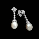 From Beverley K comes this beautiful pair of 18kt white gold dangle earrings with .20ctw of diamonds G Color VS clarity and wonderfully matched fresh water pearls each pearl is 14mm.