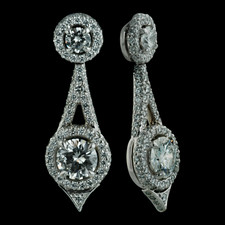 Elegant and sophicated platinum Pendulum earrings from Michael B.  The top prong set diamonds are .36ctw and are surrounded by a delicate pave halo. The intricate design of the pendulum is covered in pave diamonds that circle around 2 larger prong set diamonds that are 1.52ctw.  