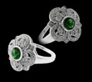 Gorgeous Beverley K flower shaped emerald and diamond ring. This flower shaped ring has a gem round emerald  weighing 1ct in the center and .42ct of diamonds outlining the petals. This ring is available in 18kt gold and platinum. Simply beautiful!