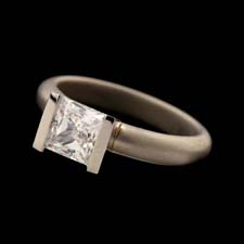 George Sawyer's ice cool platinum straight V channel engagement ring measures 3.6mm in width.  Diamond not included.