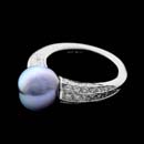 Damiani Ring 24F1: Exquisite stunner: This Damiani 18k white gold ring holds .60ctw in side accent diamonds and is finished with an exotic 10mm Tahitian black pearl. Damiani Ring 24F1 jewelry