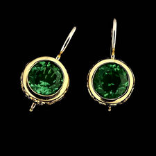 Jane Taylor 18kt yellow gold hand engraved chubby bezel earrings with green tourmalines centers.