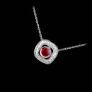 Elegant 18K white gold diamond pendant from Beverley K.  There is a cushion shape border of pave set diamonds and the center ruby is bezel set.  This pendant is available in 2 sizes, please call for pricing.  