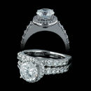 Item 27II1 - Beautiful 18kt gold A. Jaffe signature series engagement set. The engagement ring is set with .62ctw of diamonds and is made for a 7.5mm center stone. 3mm width. Wedding band is set with .65ctw. Center diamond not included. Size 6.75, gram weight 8.5
