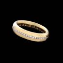Whitney Boin 18kt yellow gold 5.0mm diamond eternity wedding ring with .62ctw of channel set diamonds.