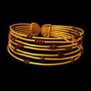 Gurhan Bracelet 28GG4: Bounce Bangle from Gurhan. Seven strands set with rubies. Ruby accents, 12.69ctw. Bracelet graduates from 15mm to 20mm in width. Gurhan Bracelet 28GG4 jewelry