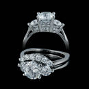 Item 28II1 - Classic A. Jaffe platinum signature series 3 stone engagement ring with matching wedding band. The e-ring is set with .79ctw of diamond and is made for a 7.5mm center stone. The wedding band is set with .40ctw of diamond and costs $2315.00 . Center diamond not included. Size 7, gram weight 9.5