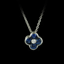 This beautiful natural sapphire and diamond pendant is the smaller size of our item #32J3.
This pendant contains .71ct. total weight in sapphires and a .03ct. diamond in the center.
The piece is set in platinum with an 18 inch platinum chain.