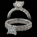 This is a beautiful platinum engagement ring from the Harout R collection. The ring is featured with a 1.00 carat princes cut diamond center, but is available with princess cuts from 0.75 carats and up. The ring is set with an additional 0.27 carats of round brilliant cut diamonds in the sides. The ring measures 4mm in width. This ring is also available in 18 karat gold. The center diamond is not included in pricing.