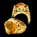 Cathy Carmendy's gorgeous 20k gold scroll tower ring with 10 ct citrine.  The citrine measures 14mm and is a double sided faceted gemstone with .50ctw of diamonds of VS2 clarity and G color.  