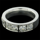 This is a classic ladies 18kt white gold diamond wedding band from the Charles Green collection measures 5mm wide. This wedding band contains 6 full cut round brilliant diamonds with a total diamond weight of approximately 1.38ct.  This ring is also available in 18kt yellow gold or platinum.  Please call for pricing in the alternate metals.