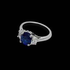 This simply stunning platinum ring from the Pearlman's Collecton features a 2.08 center sapphire enhanced by .63cts. in diamond side stones.