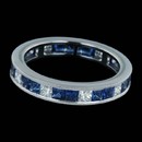 Channel set princess cut sapphire and diamond wedding ring from Spark. Set in 18k gold, with 0.65 carats total weight in diamonds and 1.71carats in sapphires. This ring is also available in platinum.