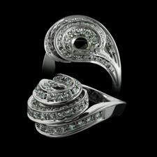 A gorgeous 18k ladies white gold Damiani swirl ring with 1.40ctw of pave diamonds. The size of the ring is 6 ¼ and looks beautiful with a measurement of 15mm thick at the rings widest point and 29mm from the shank to the top of the piece.