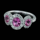 This 3 stone pink sapphire ring from the Spark Classico Collection is one our best sellers. Set in 18k gold with a 1.90 carat oval pink sapphire center and 0.54 carats in round diamonds.