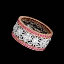 This beautiful 9.5m 18K white and rose gold wedding ring features diamonds weighing .45ct. total weight and pink sapphires weighing a total of .94ct.