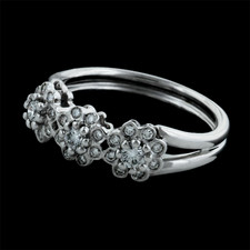 This is a beautiful 18k white gold flower wedding ring from Damiani's Anemone Collection. It contains .38ctw of diamonds. The ring measures 6mm at its thickest and 3mm at the rings thinest point. The size of the ring is 7 ¼.
