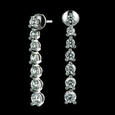 Platinum Twinset Journey diamond earrings by Gumuchian. These earrings contain a total diamond weight of over 4.0ct. The diamonds vary in size from .15ct. to .50ct. and there are even diamonds bezel set on the prongs. The earrings dangle to a length of 1 1/2 inches.