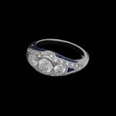 This gorgeous platinum ring features 1.00cts. in round center diamonds and .26cts. in melee enhancing diamonds and .90 in side sapphires.