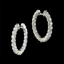 These 18kt white gold diamond huggie style earring are so brilliant.  The earrings have a total diamond weight of 3.50ct. and the stone quality is VS 2 in clarity, F in color.  Only the best for our customers.  The earrings are 25mm in diameter.  