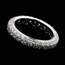 Stunning platinum pave eternity wedding ring.  This Gumuchian ring measures 4.0mm and set with 1.80ct of sparkling diamonds. The diamonds are SI1 H-I ideal cuts.  A truely amazing piece!