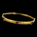Gurhan Bracelet 43GG4: Rosecut Ruby Bangle, designed by Gurhan. Seven rosecut rubies faceted to 24-karat gold. 6.5cm diameter.
Gurhan Bracelet 43GG4 jewelry