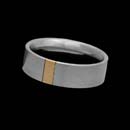 Designed by Christian Bauer, this contemporary 7mm platinum wedding band features an 18K rose gold stripe.