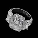 This exquisite platinum Michael Beaudry engagement ring features a 5.09ct rounded rectangular diamond flanked by .90ctw in trapezoid diamonds. This was a custom created piece, please call for comparison pricing information.