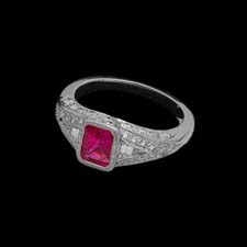 This gorgeous platinum ring shimmers with .90cts. of diamonds and features a square-cut 1.15ct. pink sapphire.