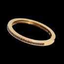 This sleek and classic 18k yellow gold wedding band by Alex Soldier features 31 black diamonds, .16ctw.