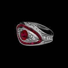 This beautiful platinum ring features a round .76 ruby center stone enhanced by 1.05 cts. in channel-set rubies and .33cts. in melee diamonds.