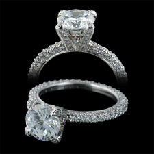 This platinum Petite Three Sided Princess pave engagement ring with diamond prongs and tips is designed by Michael B. This elegant ring is set with 171 diamonds at 1.20ctw. and is 2.2mm wide. Center diamond not included.