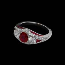 This lovely platinum and ruby ring features a 1.15ct. ruby center stone flanked by .54cts. in diamonds. The ring is enhanced with .22cts. in melee diamonds.
