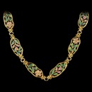 What an absolutely stunning Art Nouveau 18kt yellow gold necklace with multicolored enamel by Nouveau Collection! This piece is measured 30 inches long. The necklace weighs approximately 100 grams.