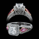 An exotic signature platinum, diamond, and pink sapphire engagement ring from Beaudry.  The ring contains .42ctw of diamonds and .57ctw of kite shaped pink sapphires. Accommodates a 1.0 ct. center asscher, cushion, cut corner diamond not included. Shanks starts at 7.25mm and tapers down to 4.07mm This was a custom created piece. 