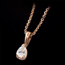 Our classic pear shaped diamond solitaire pendant with our diamond cut cable 14kt pink gold chain and handmade 18kt gold mounting. We make these from 1/4ct and larger and in 18kt white, yellow gold, and platinum. All diamonds are ideal cuts. Just pretty. This is the 1/4ct pendant.This pendant can be made in all shapes of diamonds or colored gemstones. All mountings are made in the America
