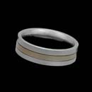 Christian Bauer designed this classic 18K yellow gold and platinum wedding band. The ring measures 6.5mm.