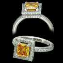 Michael B platinum Trois ring set with a beautiful princess cut Fancy Vivid Orange Yellow diamond. The diamond weighs 1.33ct. It is SI1 and Fancy Vivid Orange Yellow. .82ctw of pave set diamonds. The rings shank is 2.5mm in width.  Any size center white or colored diamond can be used.