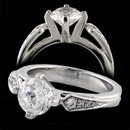 A unique design to the traditional engagement ring. This Eddie Sakamoto engagement ring is made in 18k white gold and features a 1 carat center diamond and four smaller diamonds on the side of the ring. The ring measures 2.43mm in width at the smaller part and tappers up to 3.57mm at the bottom of the ring. The diamond weight on the mounting is .12ct. total weight. The ring can be made in platinum as well. 