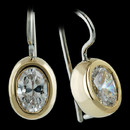 Jane Taylor Earring 54L2: Jane Taylor's oval chubby bezel earrings in two tone 18kt gold. Diamonds sold separately. Jane Taylor Earring 54L2 jewelry