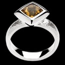 From German designer Bastian Inverun. This stering silver orange and yellow brilliant citrine center gemstone ring.  The shank of the ring has an elegant hammered finish, while the center stone is set in a bezel of bright polished silver. Comes in a finger size of 7.25.