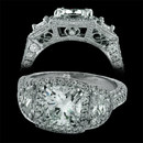 A three stone platinum pave masterpiece from Durnell. This ring is pictured with a 1.75ct cushion shaped center stone (sold seperately) flanked by two .30ct half moon sides and .87ct in pave set round diamonds. Breathtaking.