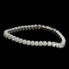 Elegant 18kt white gold diamond straight line bezel set bracelet.  The piece is set with 46 diamonds weighing 9.08ct. VS-G-H quality. Available in platinum.