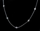 Pearlman Design: 20in. 18Kt white gold chain with 1.18Ct diamond gems spaced evenly throughout. This necklace is simply elegant and the perfect accessory for any day. 
Second photo shows this necklace paired well with another for a fashionable layered look. (Price is only for the single diamond floater) 