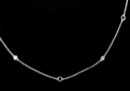 Cute 20 inch .46ct ruby and .40ct diamond floater necklace. Simple yet elegant, making this the perfect accessory for any outfit. Designed  by William Pearlman himself! 