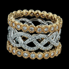 An infinity diamond stackable wedding band from Spark, with .36ctw of diamonds. Shown with bezel-set eternity bands, 1.6mm, with .48ct diamonds in 18K yellow gold, priced at $1655.00 each.