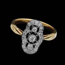 This lovely Deco-inspired 18K yellow gold ring is set with .23cts. in diamonds.