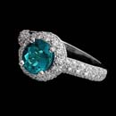 Gumuchian Ring 65J1: An exotic and rare electric blue Paraiba Tourmaline weighing 1.31ct. The mounting is from Gumuchian's "Halo" collection in platinum set with .85ct of diamonds. This ring has a 10mm top and is a size 6.5. Gumuchian Ring 65J1 jewelry